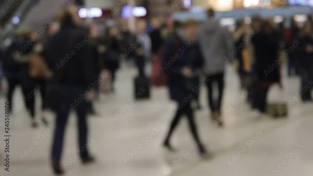 crowd rush hour commuters defocussed people walking city urban background stock footage video clip film