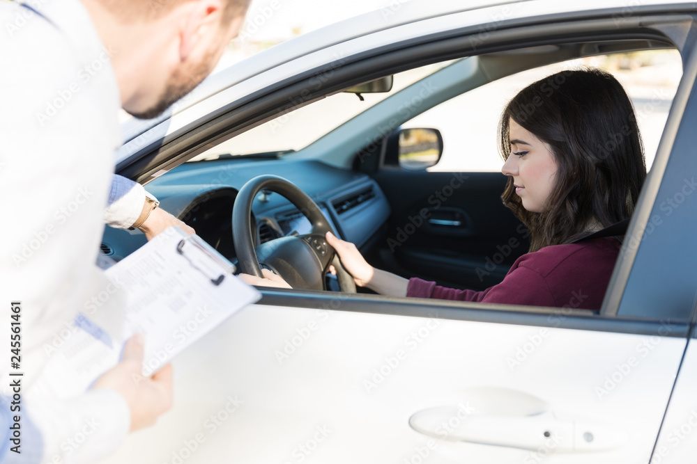 Young Student Learning To Drive Car Young Student Learning To Drive Car
