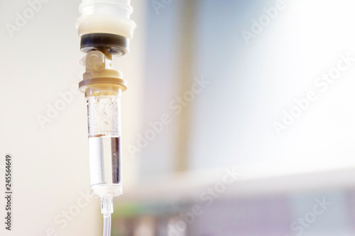 Fotografie Saline water drops machine or medical instruments for infusion to blood vessel and for treatment sick or patient in hospital room