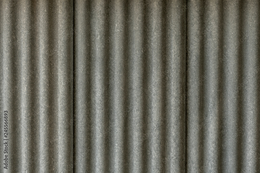 Texture of fiber cement roof sheet. Close up of corrugated wave