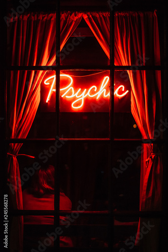 Psychic neon sign at night, in the West Village, Manhattan, New York City photo