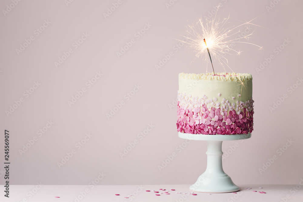 Birthday cake with sparkler Stock Photo | Adobe Stock
