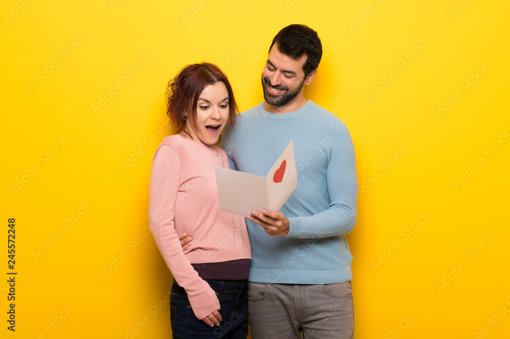 Couple in valentine day with valentines day card Couple in valentine day with valentines day card