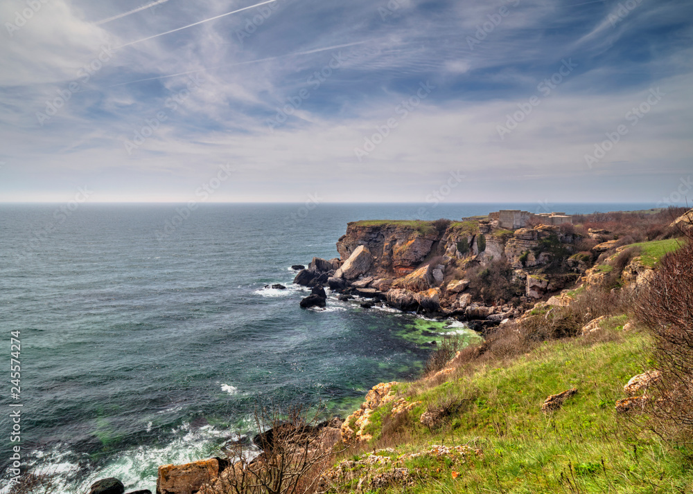 Beautiful landscape with blue sea and rocky shore Beautiful landscape with blue sea and rocky shore