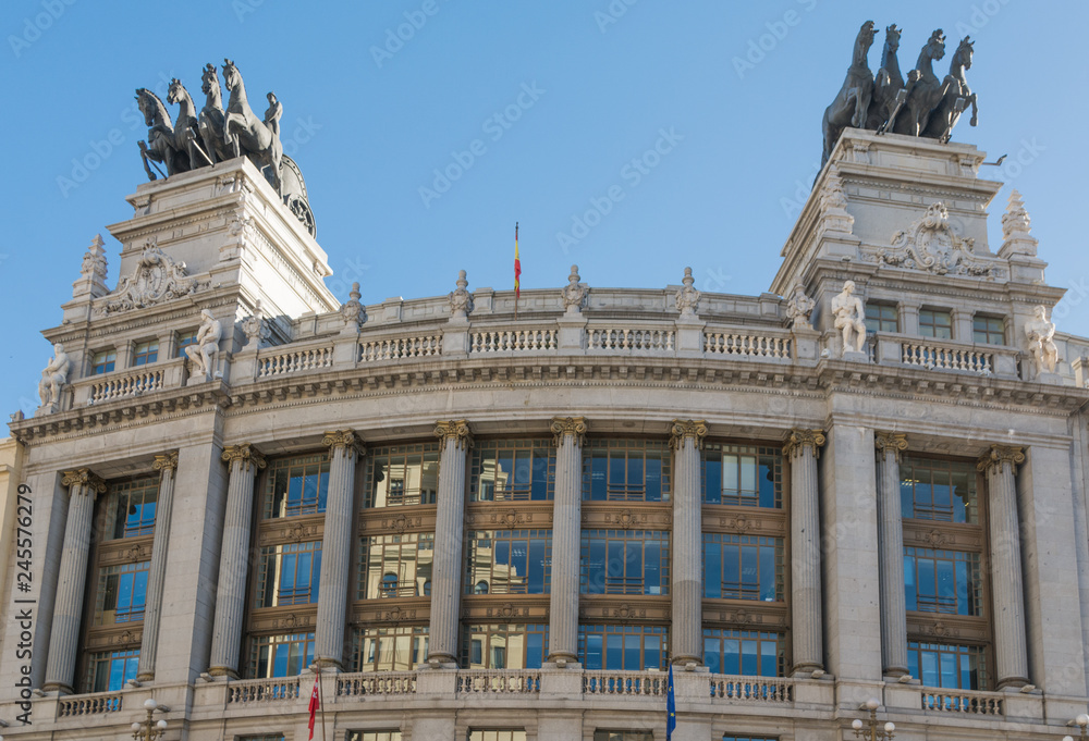 Front View of the Quadriga Building on top of a building on Alcalá Street in Madrid