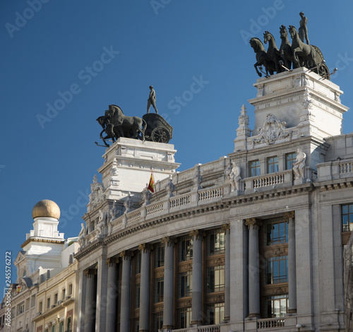 View of the Quadriga on the top of Building on top of a building on Calle Alcalá, 16 in Madrid, Spain.
