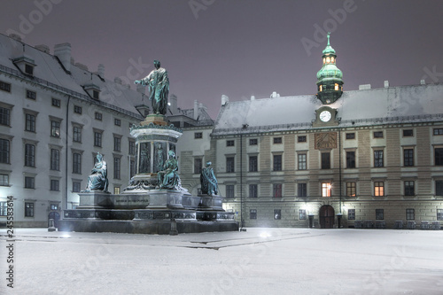 Photography Kaiser Franz II Monument at the Hofburg Palace in Vienna, Austria with snow