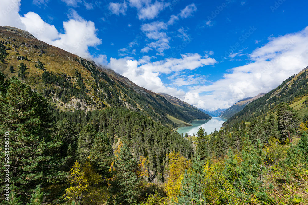Obraz premium Mountains, peaks, lake, everlasting ice and trees landscape. Kaunertaler Gletscher natural environment. Hiking in the alps, Kaunertal, Tirol, Austria, Europe