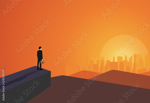 Businessman stand on cliff look at success in the city © pishit