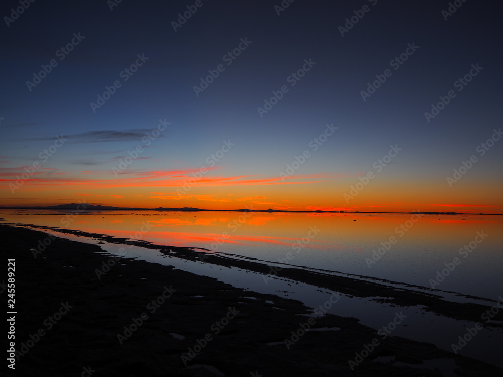 sunset over the Uyuni salar sunset over the Uyuni salar