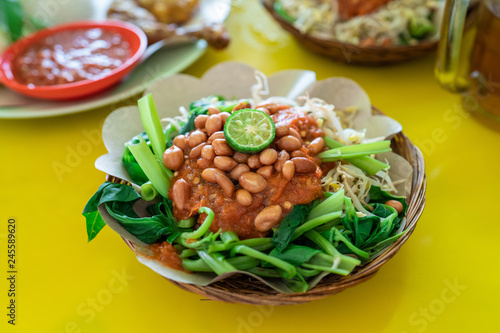 indonesian plecing kangkung with sambal photo