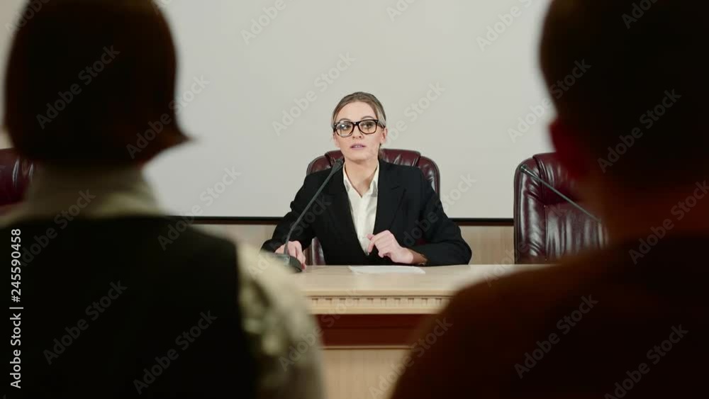 Businesswoman politician is speaking at press conference and nervous. Businesswoman politician is speaking at press conference and nervous.