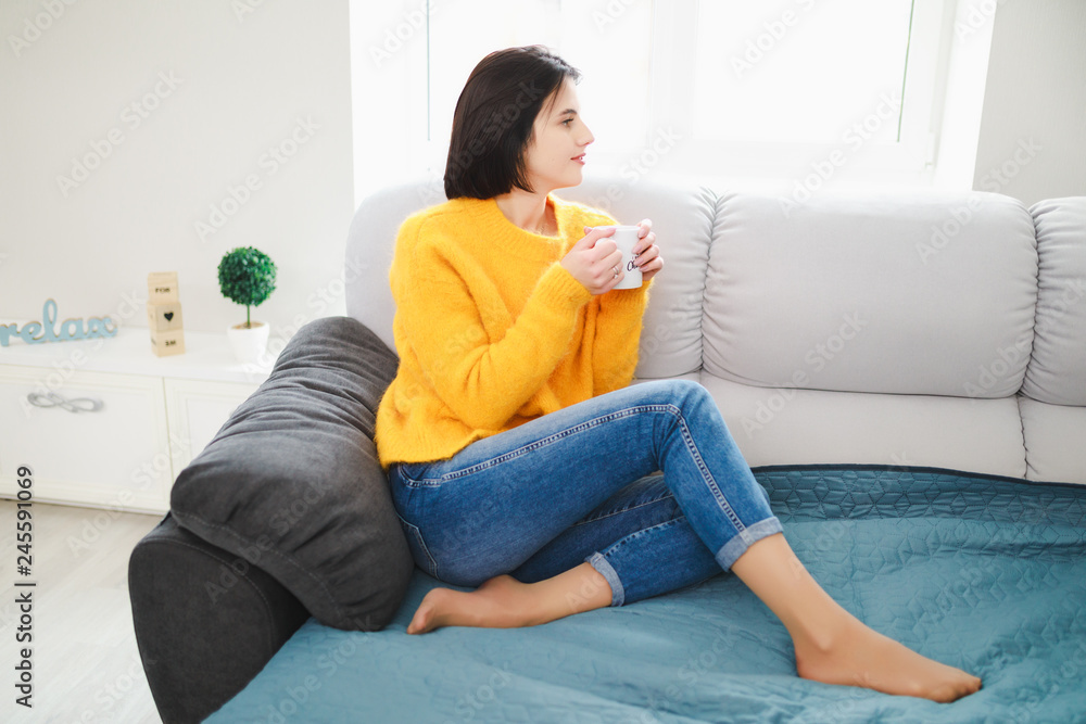 Woman drinking tea at home Woman drinking tea at home