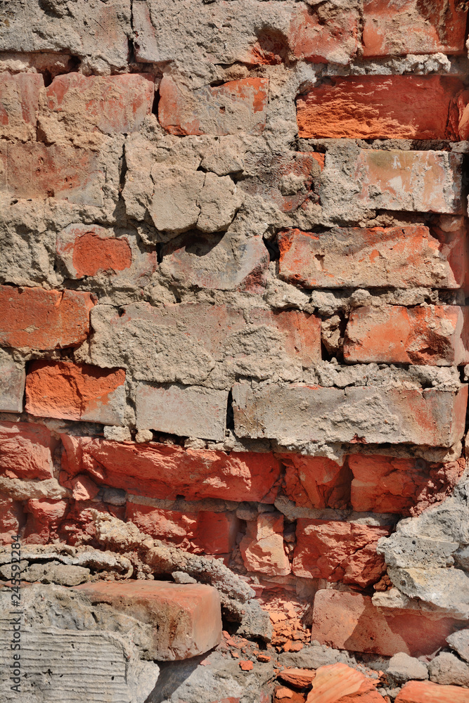 Obraz premium old collapsing brick wall close up