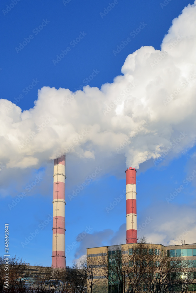 Stream of smoke from the chimney of a factory Stream of smoke from the chimney of a factory