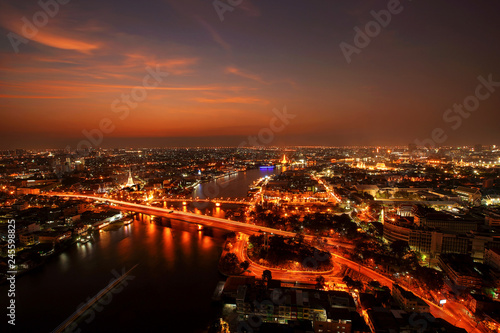 City Scape, Panorama of Chao Praya River. River view overlooking the Phra Phuttha Yodfa Bridge or Memorial Bridge and Wat Arun with grand Palace in the background, Bangkok Thailand. 26 January 2019