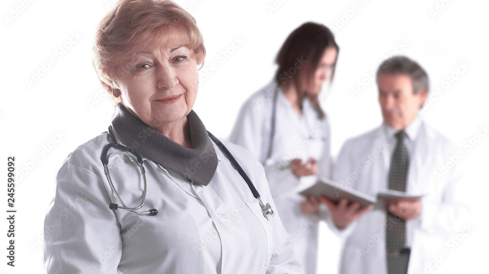 adult female doctor therapist on blurred background of colleagues adult female doctor therapist on blurred background of colleagues