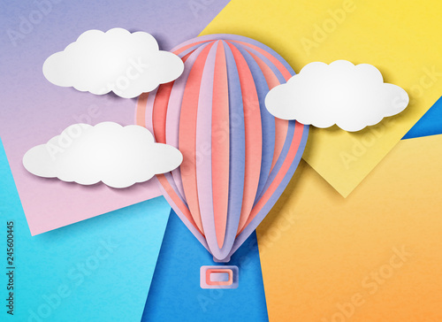 Vector illustration of a balloon flying in the sky among the clouds on an abstract bright multi-colored background in the style of cut paper