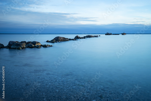 Calm blue see and big stones on the beachbeach,