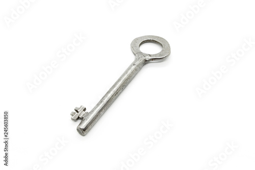 Old silver key isolated on white background