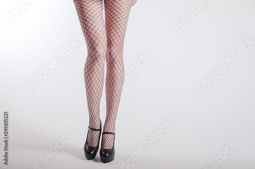 woman legs in black stockings