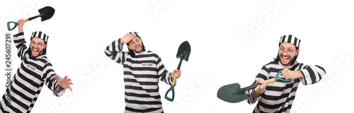 Prison inmate with spade isolated on white
