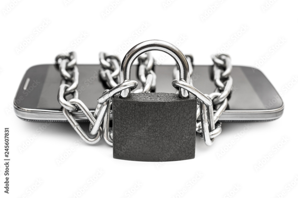 Smartphone tied by chain with padlock on white background. Protected information on smartphone.