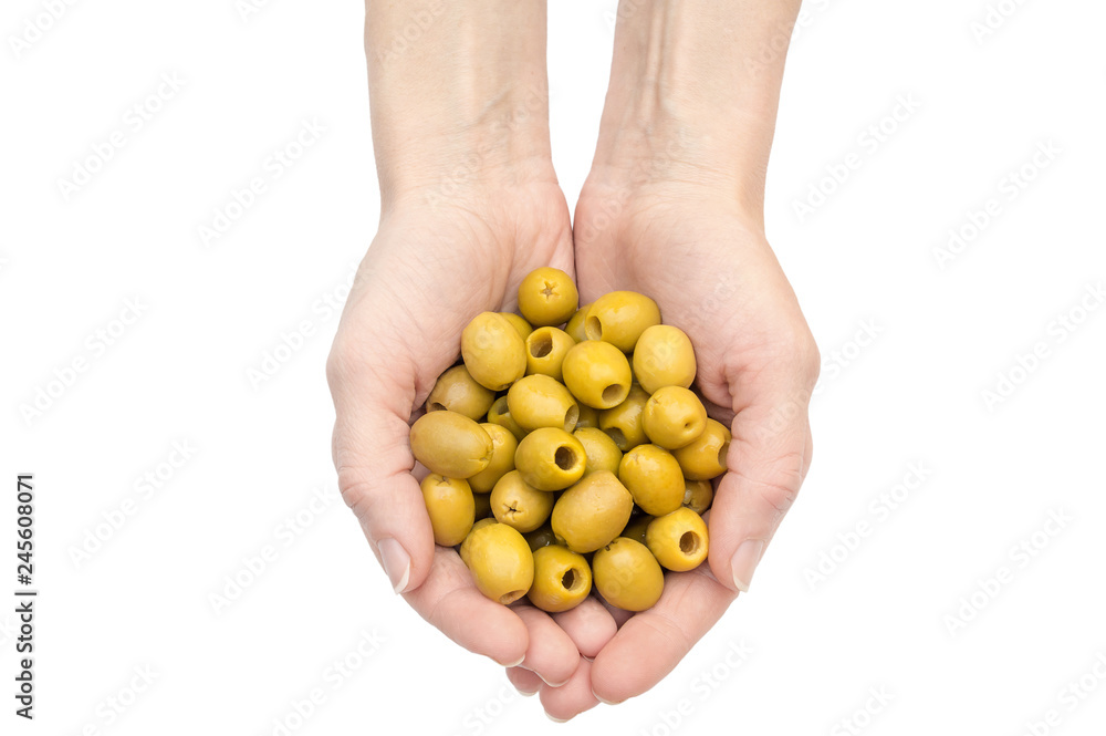 Woman's hands holding olives in palms. Isolated on white. Woman's hands holding olives in palms. Isolated on white.