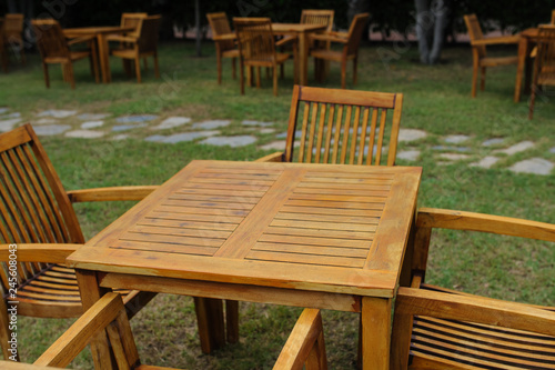 wooden chairs with table outdoors at a hotel in Turkey © Med Photo Studio