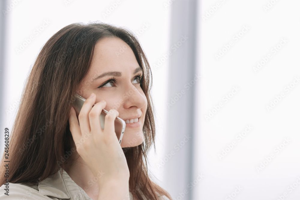 close up.businesswoman talking on a cell phone close up.businesswoman talking on a cell phone