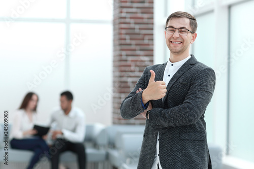 businessman showing thumb up. concept of success