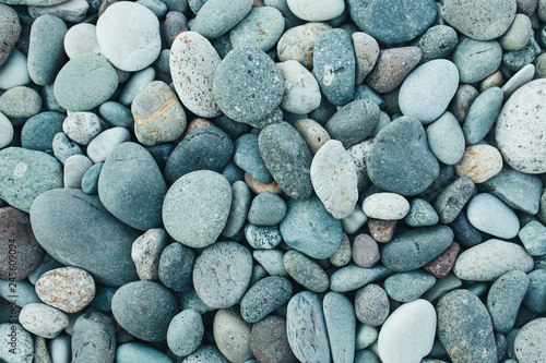 abstract background with dry round peeble stones. Sea stone close up