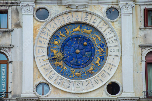 Tower with Astronomical clock and Lion statue. Venice, Italy