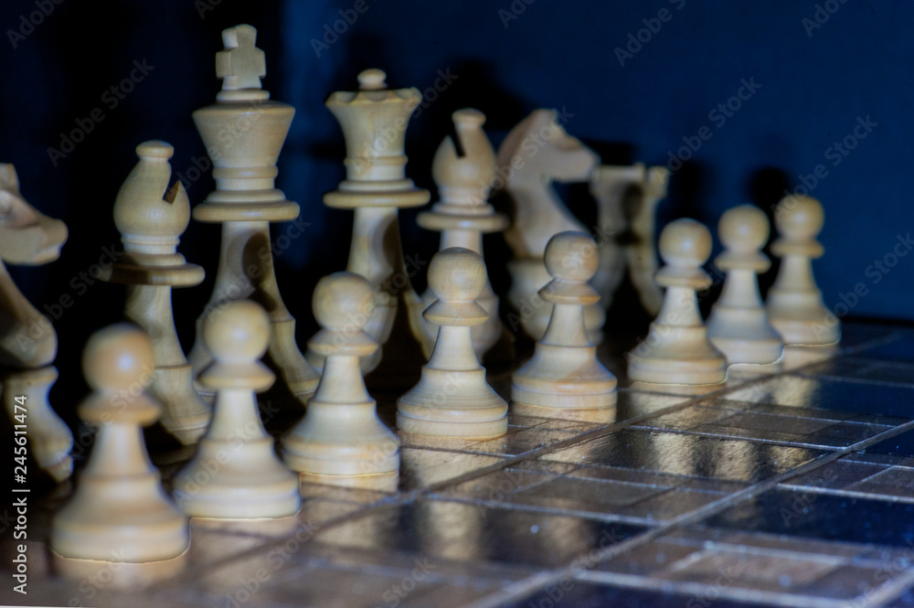chess pieces on a board chess pieces on a board