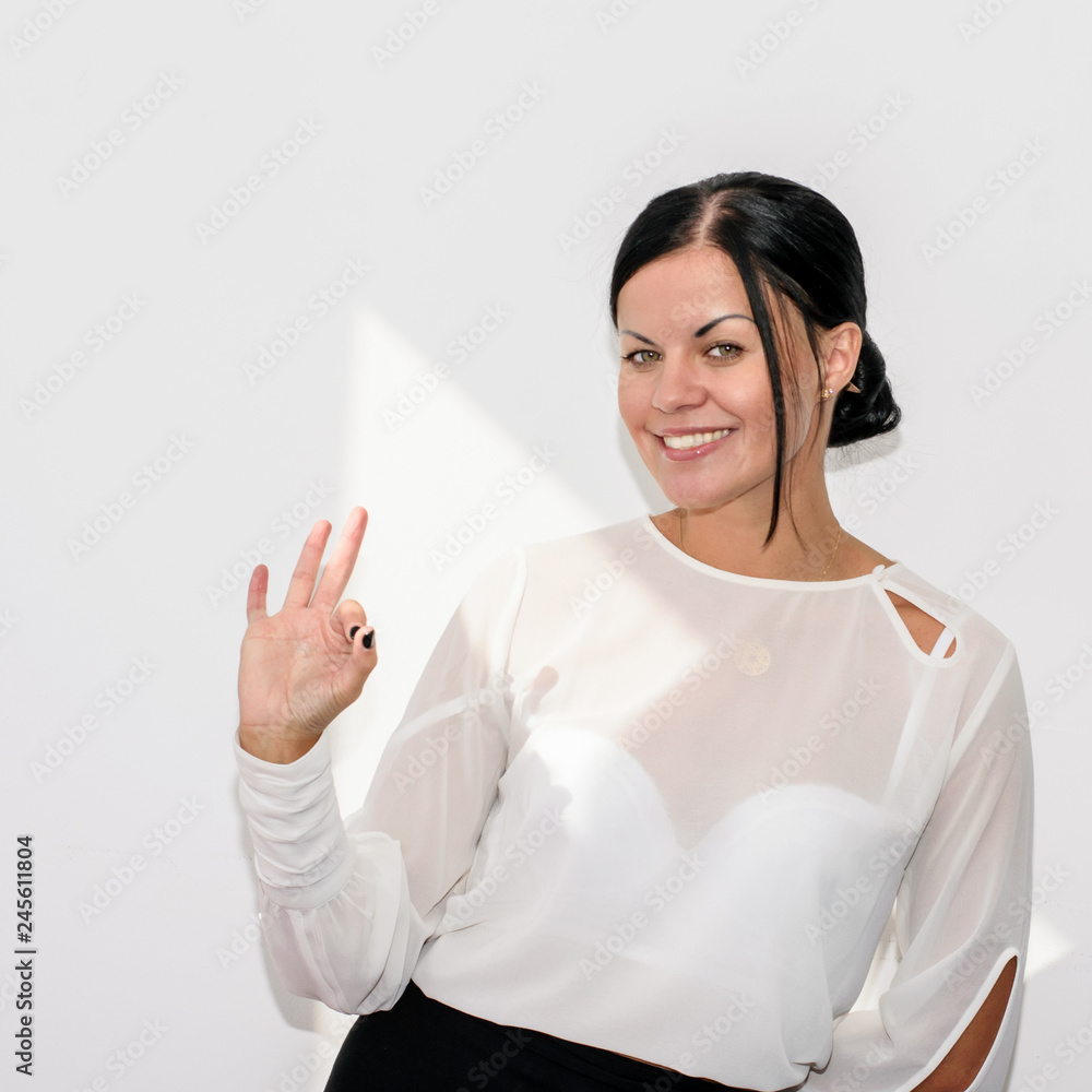 Young successful girl on the white background. Young successful girl on the white background.