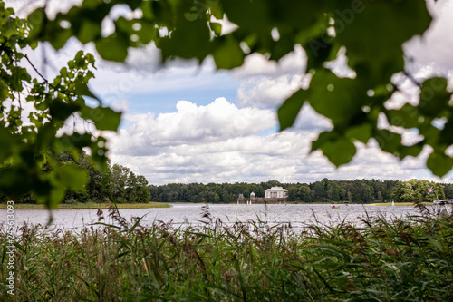 TRAKAI, LITHUANIA: Uzutrakis manor on the board of Galves lake near Trakai town photo