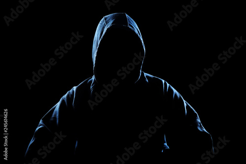 Anonymous silhouette of man in hoodie