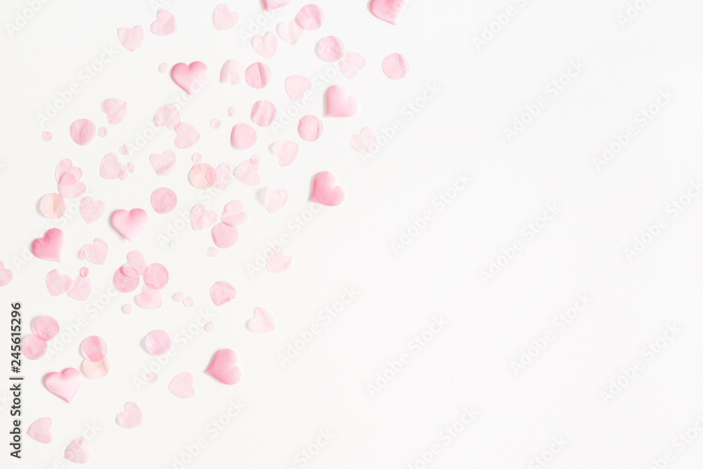 Valentine's Day background. Pink hearts on white background. Valentines day concept. Flat lay, top view, copy space