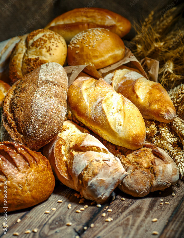 Fresh fragrant bread on the table. Food concept Fresh fragrant bread on the table. Food concept