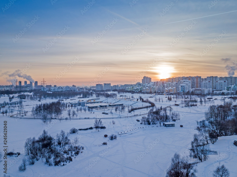Aerial view of the colorful frosty winter evening and residential areas in Moscow. Aerial view of the colorful frosty winter evening and residential areas in Moscow.