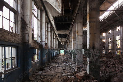 Abandoned large industrial hall with garbage. Voronezh excavator manufacturing factory
