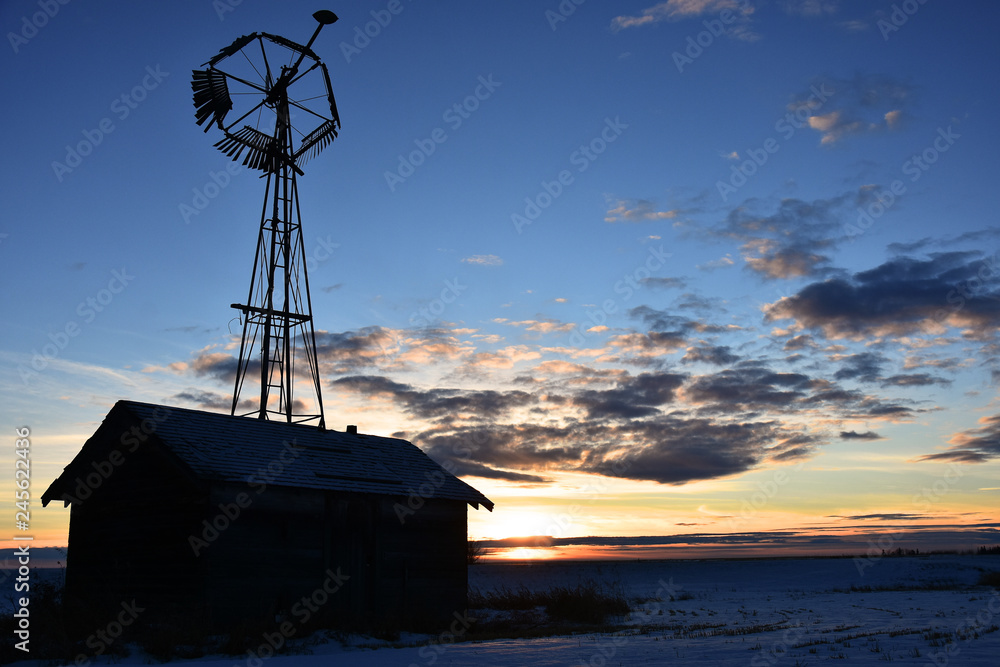 Old Agricultural Windmill as Sunset