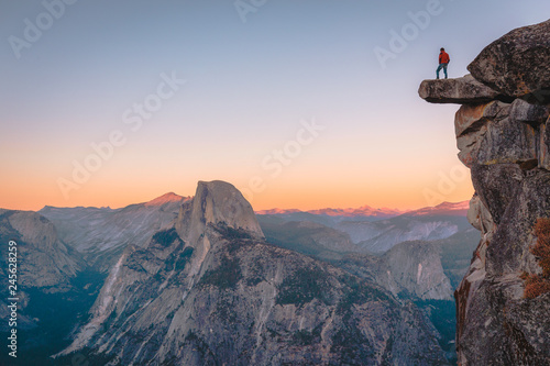 Obraz na płótnie Hiker on a cliff in Yosemite National Park, California, USA w salonie
