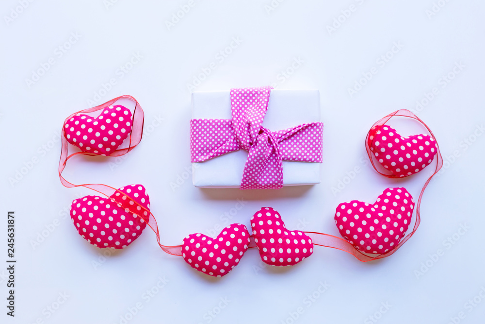 Gift box with Valentine's hearts on pink background. Gift box with Valentine's hearts on pink background.