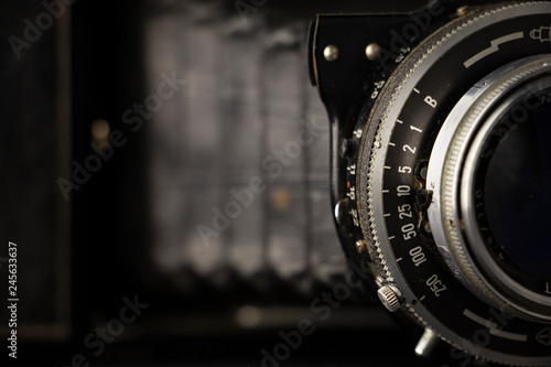 Wallpaper Mural Bellows analogue camera on the black background and it like vintage or retro concept. Torontodigital.ca