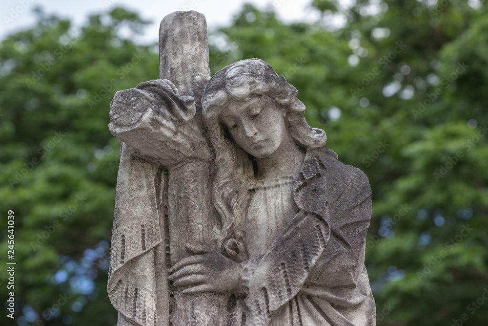 statue of an angel in cemetery