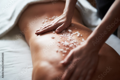 Close up of healthy massage with mineral salt photo