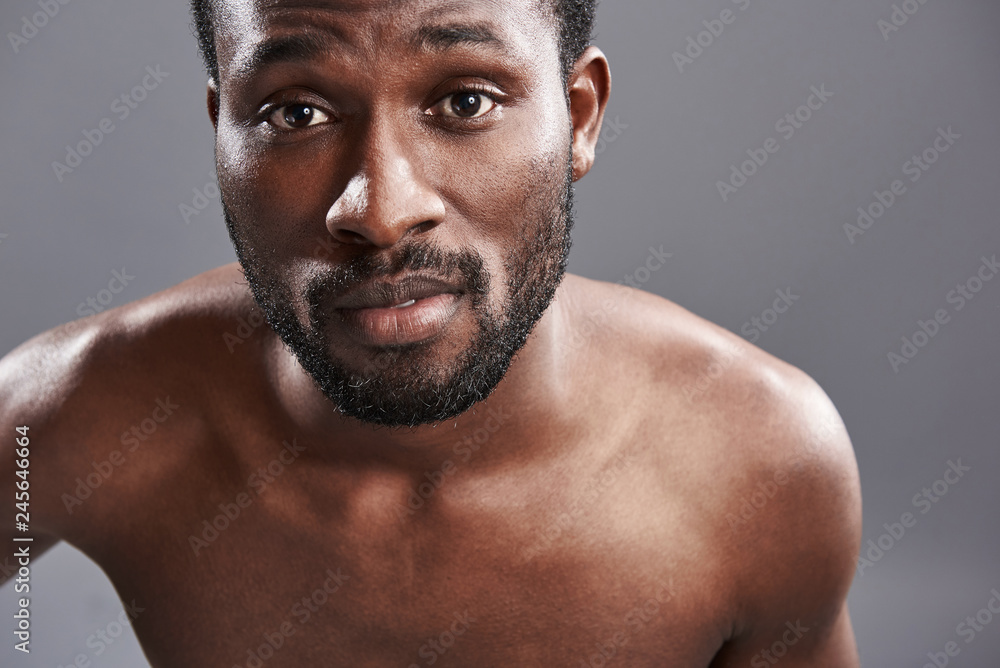 Portrait of a handsome afro American man looking at you Portrait of a handsome afro American man looking at you