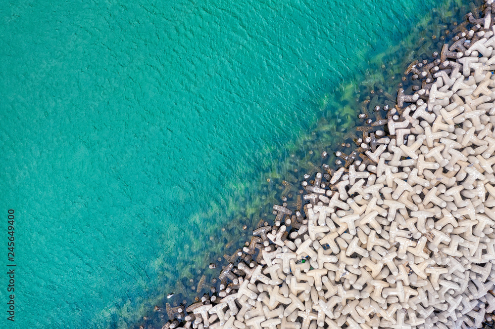 Tetrapod Breakwater in turquoise water, taken in Kuwait in December 2018 taken in hdr