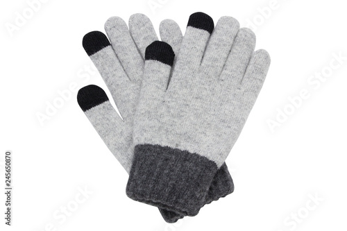 Grey woolen knitted gloves isolated on white background